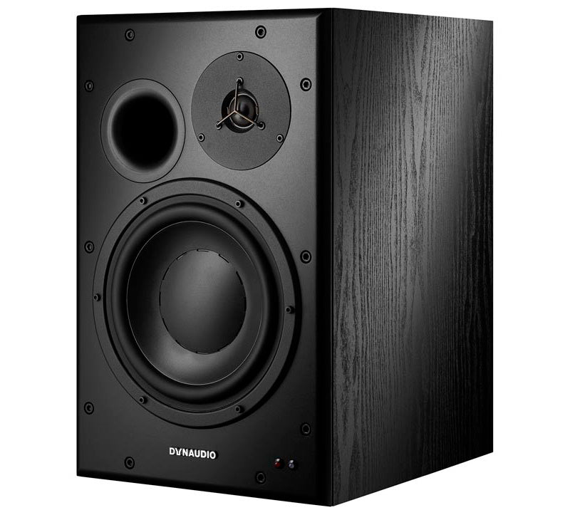 Dynaudio BM15A Active Studio Monitors, angled front view. A powerful two-way active studio monitor featuring a 10-inch woofer, 1.1-inch soft-dome tweeter, and a front ported bass reflex design, made for high-performance nearfield and midfield monitoring applications.