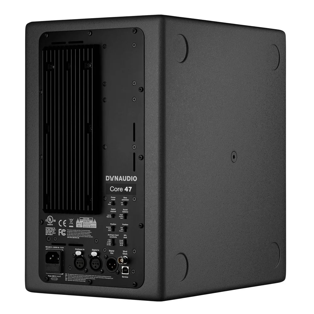 Dynaudio CORE 47 3-Way Powered Studio Monitor, back view. Displays the comprehensive DSP control panel, including boundary and balance filters, along with balanced analog (XLR), AES digital I/O, and Word Clock connections for seamless professional studio integration.