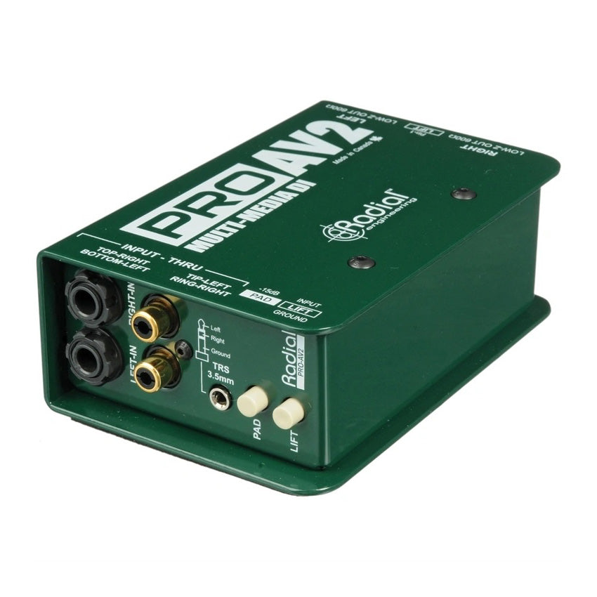 Radial Engineering ProAV2 Audio/Video Passive Stereo DI Box, angled top view. Displays dual 1/4" and RCA inputs, a 3.5mm input jack, a -15dB pad switch, and a ground lift switch for flexible unbalanced stereo input.