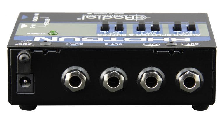 Radial Shotgun Instrument Buffer/Splitter, back view, showing the four 1/4" Outputs and power input.