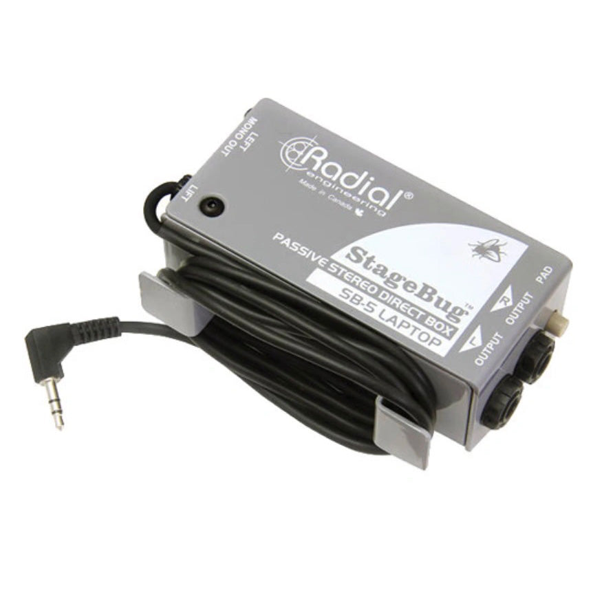 Radial StageBug SB-5 Stereo Laptop DI, angled top view. Features a compact design with a hardwired 3.5mm stereo input cable with a cable cleat for storage, stereo output with a mono output jack, a -15dB pad and ground lift switch, for connecting laptops and mobile devices to a PA system.