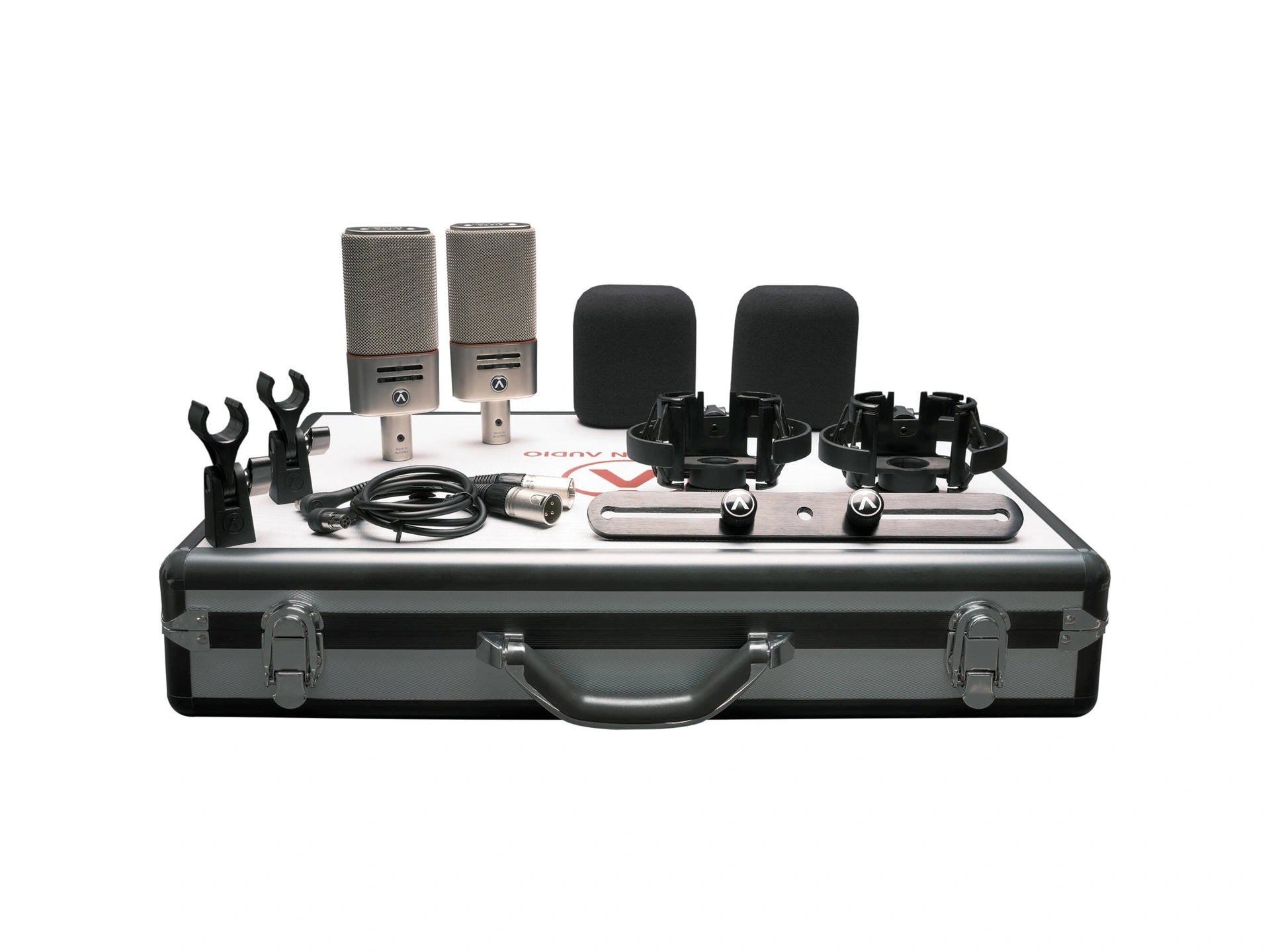 Austrian Audio OC818 Dual Set Plus Large-Diaphragm Multipattern Condenser Microphone Pair Silver contents with custom carry case, showcasing two OC818 microphones, shock mounts, mini-XLR cables, stereo bar, and other essential accessories neatly arranged.