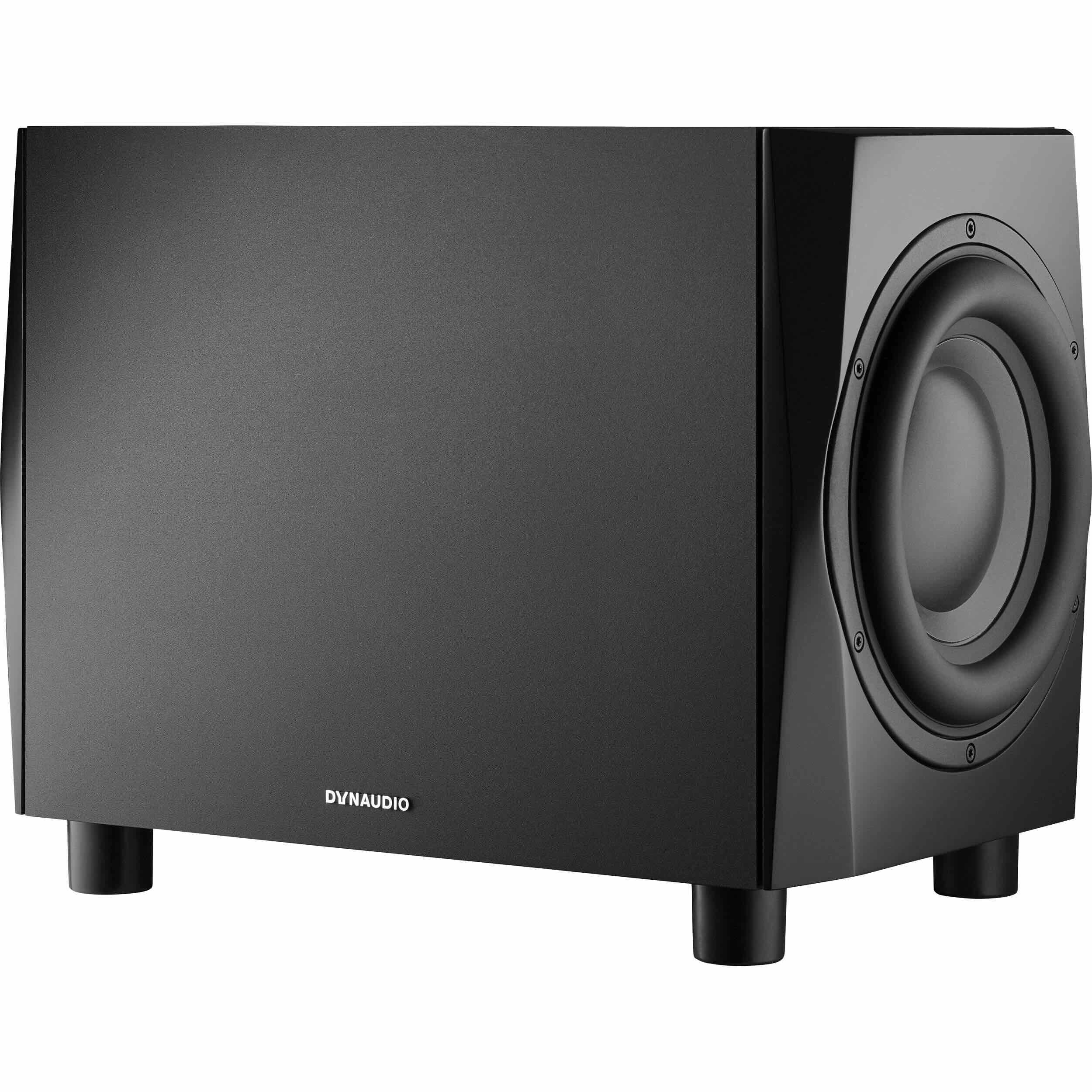 Dynaudio Acoustics 18S True Bass dual 9.5" active subwoofer, 500W, front angled view. Shows the professional, minimalist cabinet design with one of its two 9.5-inch drivers visible, highlighting the powerful and precise low-frequency reproduction for studio applications.
