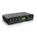 MOTU M6 6x4 USB-C Audio Interface, showing its front panel with gain controls, buttons for phantom power and individual mointoring, A/B switch, two headphone outs and a large LCD metering display.