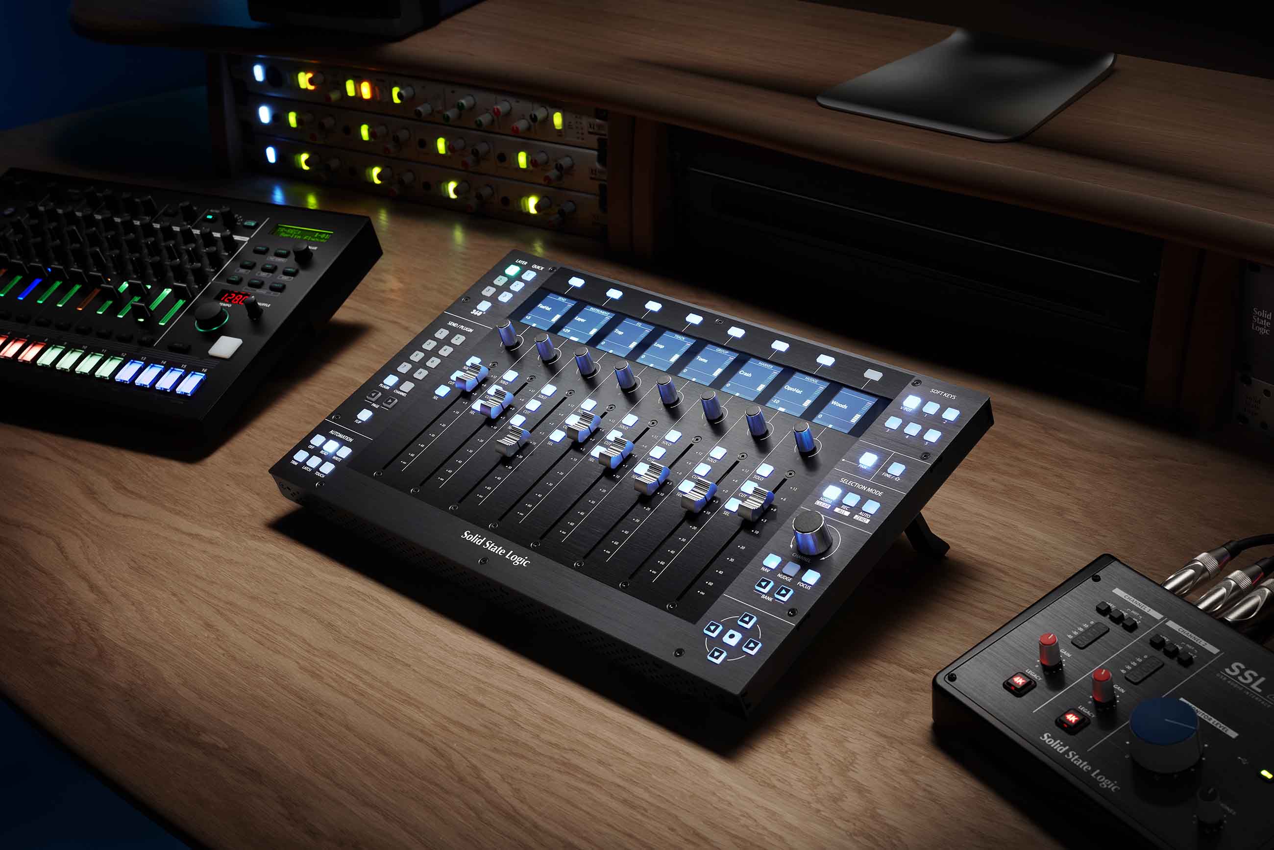 Solid State Logic UF8 Advanced DAW Controller, showing its sleek control surface with eight motorized, touch-sensitive faders, eight high-resolution LCD TFT displays, and numerous RGB backlit soft-touch buttons and rotary encoders.